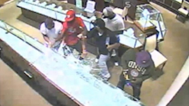 VIDEO: Police release security footage of robbery at jewelry store in an Atlanta mall.