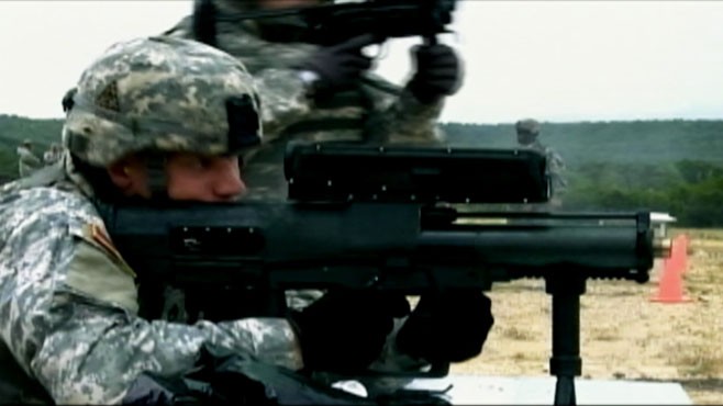 VIDEO: XM25 features programmable rounds to take out insurgents behind cover.