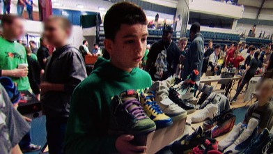 Alex Asfar, 15, from Middletown, N.J., barters limited edition Nikes at a sneakers convention in New York City.