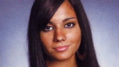 PHOTO: College junior Andrea Rebello is shot by an officer in gun battle with wanted criminal.