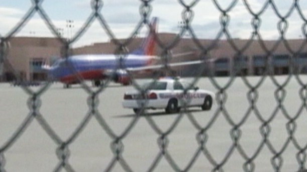 Video: Flight attendant takes baby away from alleged fighting parents.