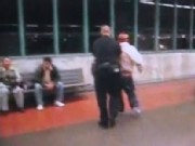 Officer Shoves Unruly Man Into Glass