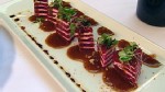 VIDEO: Chef Wolfgang Puck tosses personalized pizzas at your table.