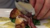 VIDEO: Oceana chef Ben Pollinger rolls calamari into a filling taste sensation. 