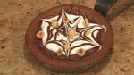 VIDEO: Village Tart chef Pichet Ong folds together chocolate truffles and meringue.