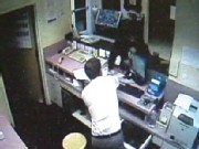 Hotel Clerk Fires Gun at Robber