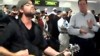 VIDEO: A guitarist leads stranded passengers at Newark Airport in a Beatles singalong.