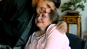 PHOTO Arnulfo Ponce hugs Leigh Gilmore upon reuniting for the first time since 9/11.