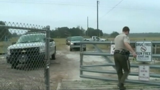 VIDEO: On drive to hunting range, dogs sudden movements cause owner to shoot himself.