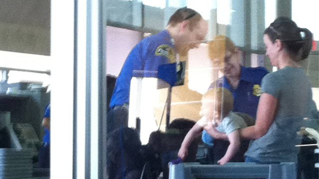 PHOTO: baby airport screening
