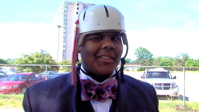 PHOTO: Cap: Balaal Hollings, who was shot in the head on April 6, was able to surprise his classmates at their high school graduation in Detroit on June 4, 2013.