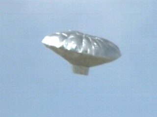 Raw Video: Boy Floats Away In Flying Saucer