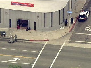 Bank Robbers Strap 'Bomb' on Manager