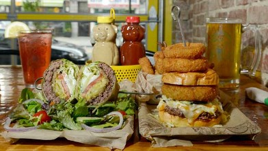 PHOTO: The Mediterranean lamb burger in a lettuce wrap and the Supreme Beef burger served with fries and Onion rings are served at Bare Burger, Astoria Queens, New York, July 25 ,2012.