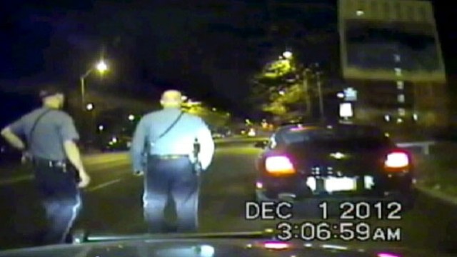 VIDEO: Footage shows cops approaching linebackers car the morning of murder-suicide.