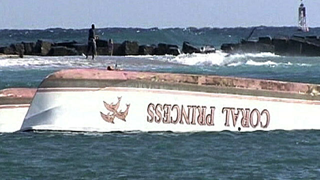PHOTO: A wave capsized a catamaran, tossing 21 passengers and two crew members into the ocean off the coast of Pompano Beach, Fla.