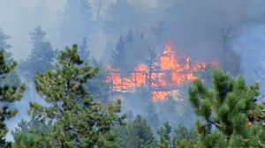 PHOTO A wildfire, which started today in Fourmile Canyon northwest of Boulder is threatening many homes.