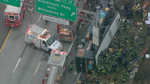 PHOTO: At least 13 people have died after a tour bus crashed and overturned on a highway in the Bronx area of New York early this morning. The accident happened just before 6 a.m. at the Hutchinson River Parkway near the exit of the New England turnway.