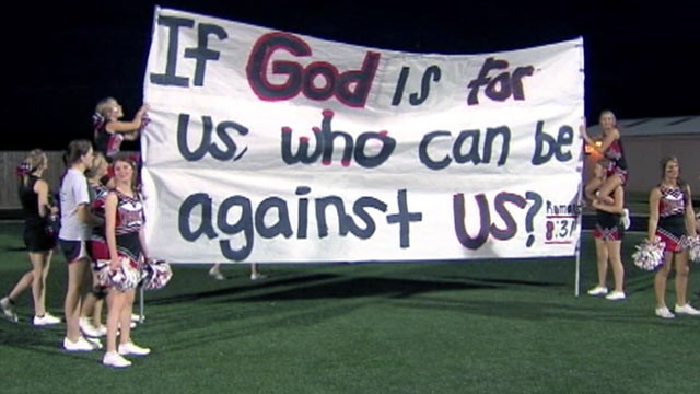 PHOTO: Cheerleaders in East Texas are now fighting back after the Bible verses they painted on banners to display at games were banned.