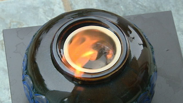 PHOTO: A ceramic fire pot blew up, splattering Michael Reyer with flaming gel fuel.