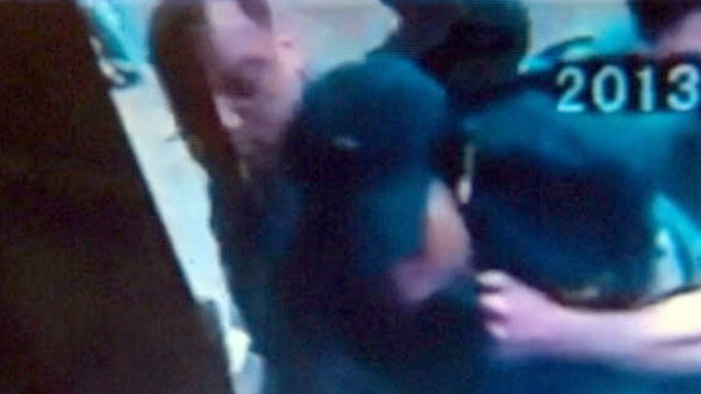 PHOTO: A man is charged with attempted murder after being caught trying to hack his wife in the head with a cleaver in the middle of the sidewalk in New York's Chinatown, Feb. 24, 2013.