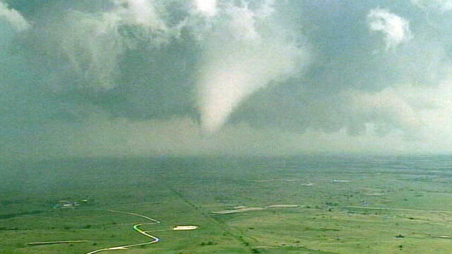PHOTO: Dark storm and funnel clouds form over Dallas, Texas on April 25, 2011.