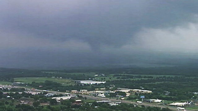 PHOTO: A powerful tornado is seen touching down near the city of Dallas, TX., April 3, 2012.