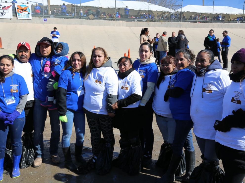 Debora and her reunited family are pictured here at the Hugs Not Walls event.