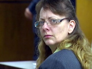 Woman Accused of Trying to Saw Off Husband's Head