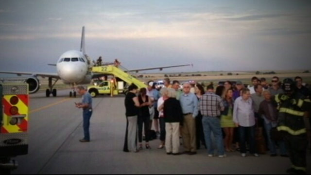 PHOTO: Officials say one person was taken into custody following a "possible security threat" on a Denver-bound flight on Friday, June 14, 2013.