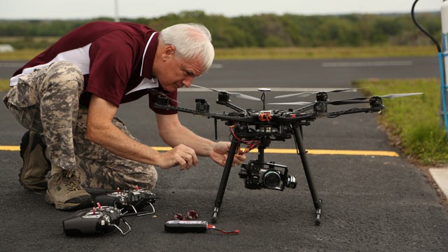PHOTO: Gene Payson, an instructor at the new Unmanned Vehicles University in Sarasota, Fla., tinkers with a drone. The program is the only institution in the United States to offer post-graduate engineering degrees in unmanned aerial vehicle systems.