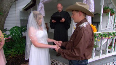 Reagan [last name withheld] and Evan Madison during their wedding ceremony. Reagan's pregnancy led to her emancipation from her parents, who she felt were pressuring her to have an abortion.
