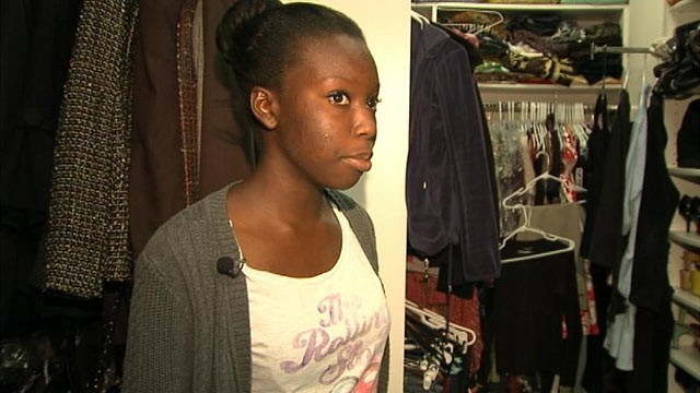 PHOTO: Fifteen-year-old Doyin Oladipupo hid in her parents walk-in closet, crouching under a rack of clothes, when intruders entered her home. She stayed on the line with the 911 dispatcher as the burglars entered the room.