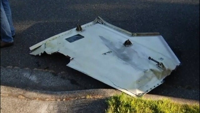 PHOTO: The FAA is investigation after a refrigerator door-sized aircraft part crashed into a Seattle neighborhood.