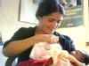 Actress Salma Hayek breastfeeds another mother's son in Sierra Leone to tout the benefits of breastfeeding in a country where it is frowned upon after the first few months of a baby's birth.