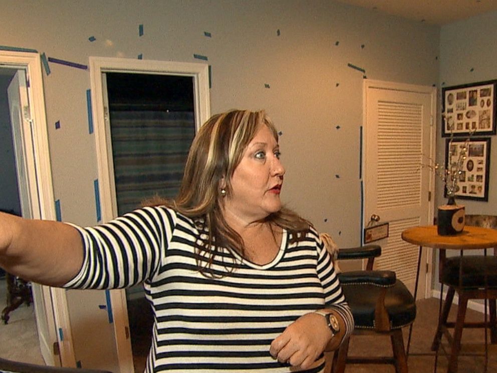 Investigation: New Home Heartbreak PHOTO: Freelance makeup artist Jackie Walker put blue tape where she said nails have popped back out from the wall in her new home.
