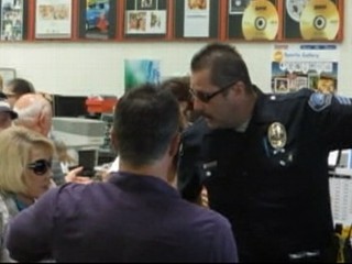 Watch: Joan Rivers Escorted Out of Costco