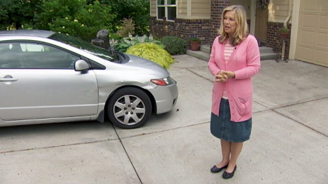 PHOTO: Marilyn Harker stands by her car that was hit by a bear as she was exiting Interstate 205 in Vancouver, Wash.