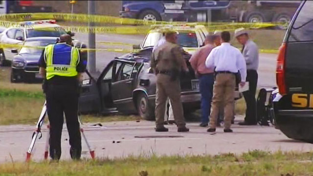 PHOTO: A suspect driving a black Cadillac with Colorado plates led authorities on car chase across two Texas counties that ended with a car crash and shootout, severely injuring the driver of the Cadillac, on March 21, 2013.