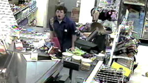 PHOTO The car narrowly missed a direct collision with the cashier inside.