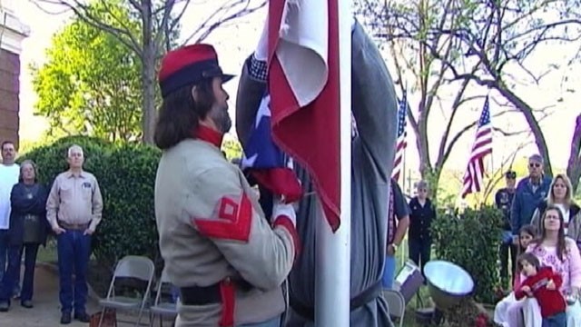 PHOTO Confederate Flag Causes Controversy
People are divided over the raising of the flag over a Texas courthouse.