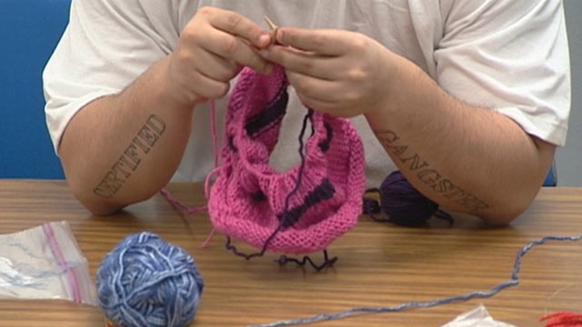 PHOTO:  The "Knitting Behind Bars" volunteer program has taught more than 100 prisoners to knit.