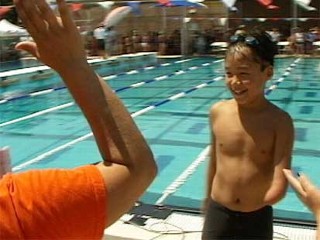 One-Armed Boy Wins Swimming Title