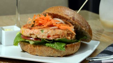 PHOTO: The Salmon burger is a healthier option served at Marx restaurant with a side salad and Apple Martini, July 20, 2012.