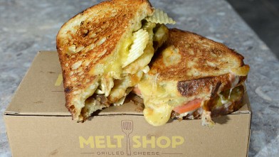 PHOTO: The Dirty grilled cheese features pepper jack cheese with caramelized onions, pickled jalapenos and is topped with crunchy potato chips, and served on sourdough bread in New York City, Oct. 4, 2012.