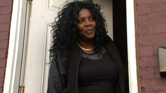 PHOTO: Merlande Wilson speaks to the media from the door of her Baltimore, MD, home, April 2. 2012.