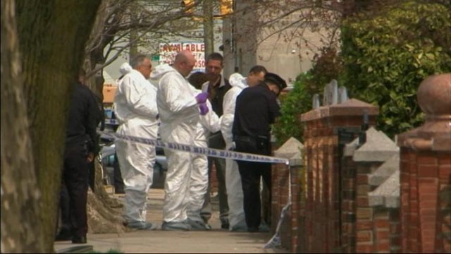 PHOTO: New York Police investigate the scene in the East Flatbush section of the New York borough of Brooklyn, where a an off-duty police officer shot her boyfriend, baby and herself to death on April 15, 2013.