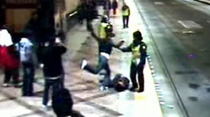 Guards watch as teen is beaten