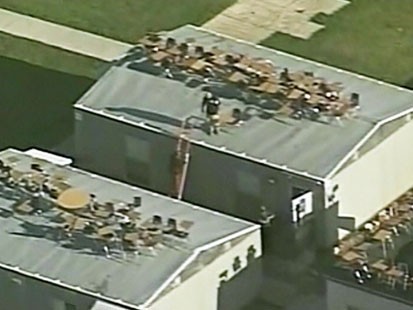 Video: High school prank sends chairs flying.