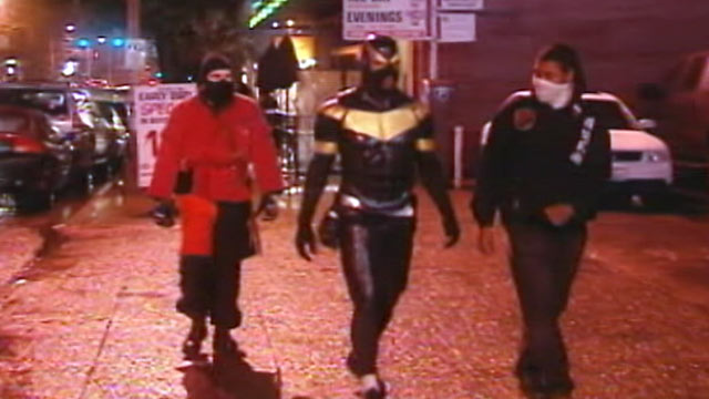PHOTO: "Phoenix Jones", center, was arrested, Oct. 9, 2011, for investigation of assault in Seattle.